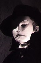 Claude Rains, a brilliant actor, is the man behind the mask here. He, sadly, died nearly twenty years before I was born.